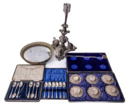 A Victorian silver plated Centerpiece, with grotesque mask mounts and perched swans on a triform