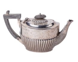 An attractive Georgian style miniature Teapot, the hinged top over domed and reeded design with