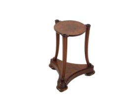 An unusual walnut Jardiniere Stand, the circular platform top supported by three outsplayed uprights
