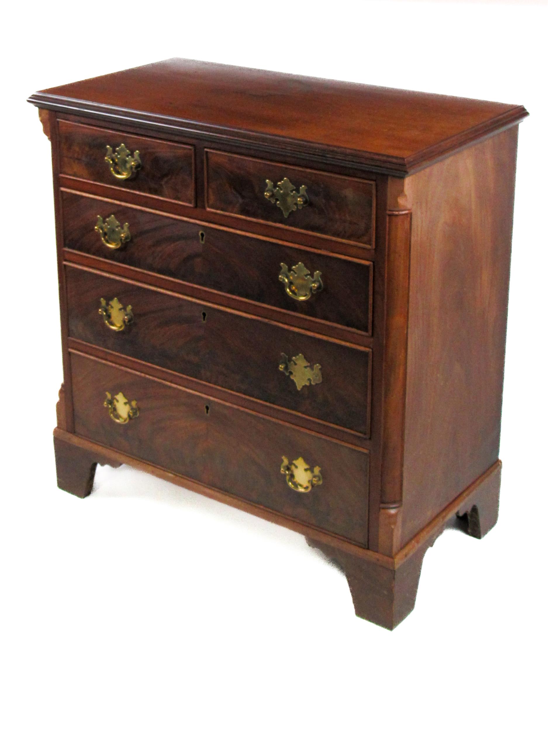 An attractive mahogany Chest, of small proportions in the Georgian style, with three long and two