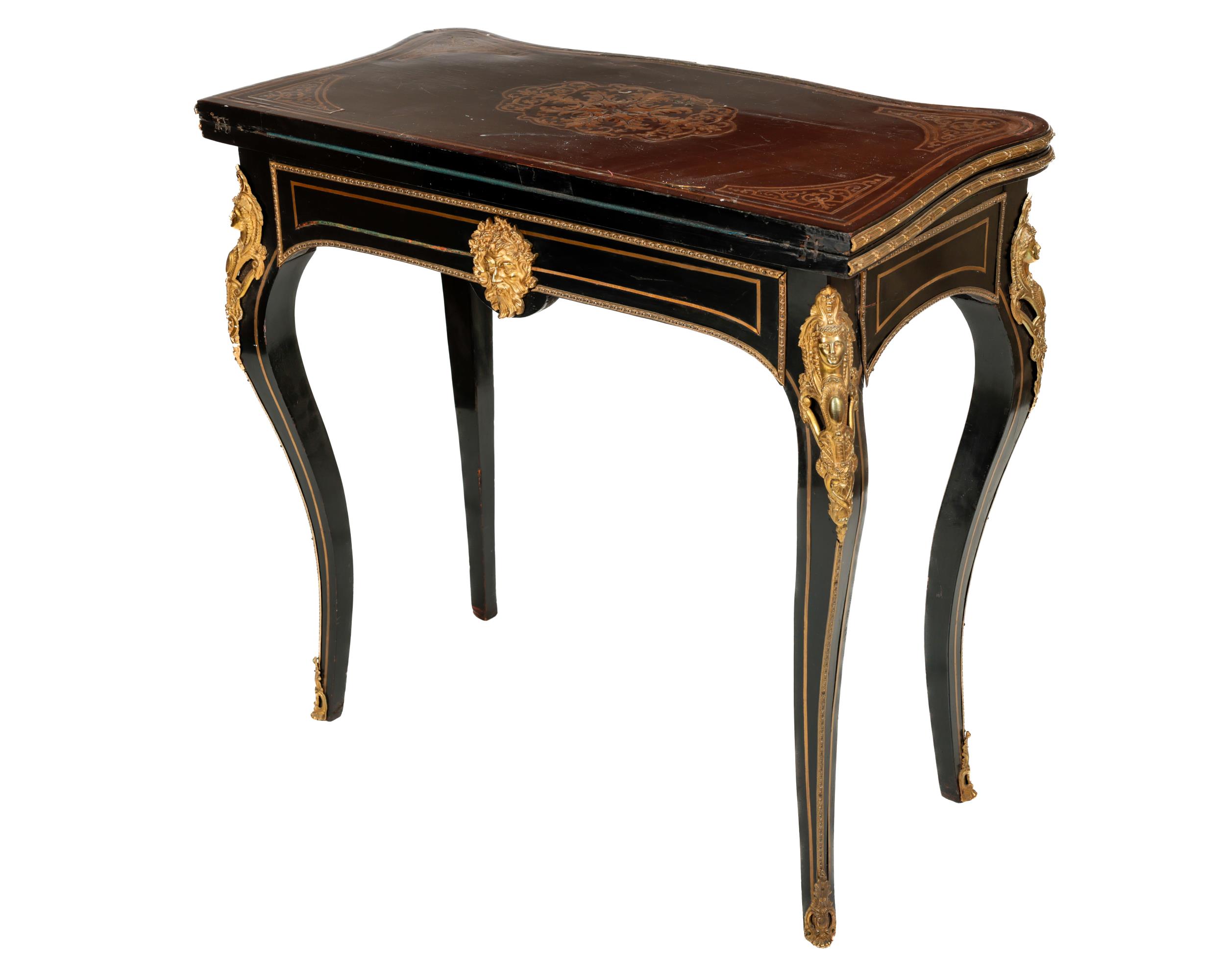 A 19th Century French ebonised and brass inlaid fold-over Games Table, the top opening to reveal a
