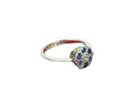 An 18ct gold Ladies cluster Ring, set with six 2.5mm round (.48ct) sapphires and six rosecut