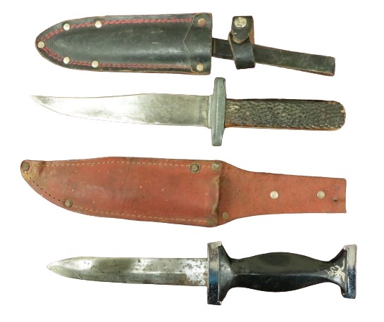 Militaria: A World War II Trench Dagger, with ebonised handle and leather scabbard with red