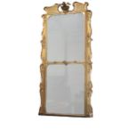 A large late 18th Century / early 19th Century giltwood upright compartmental Pier Mirror, with swan