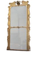 A large late 18th Century / early 19th Century giltwood upright compartmental Pier Mirror, with swan