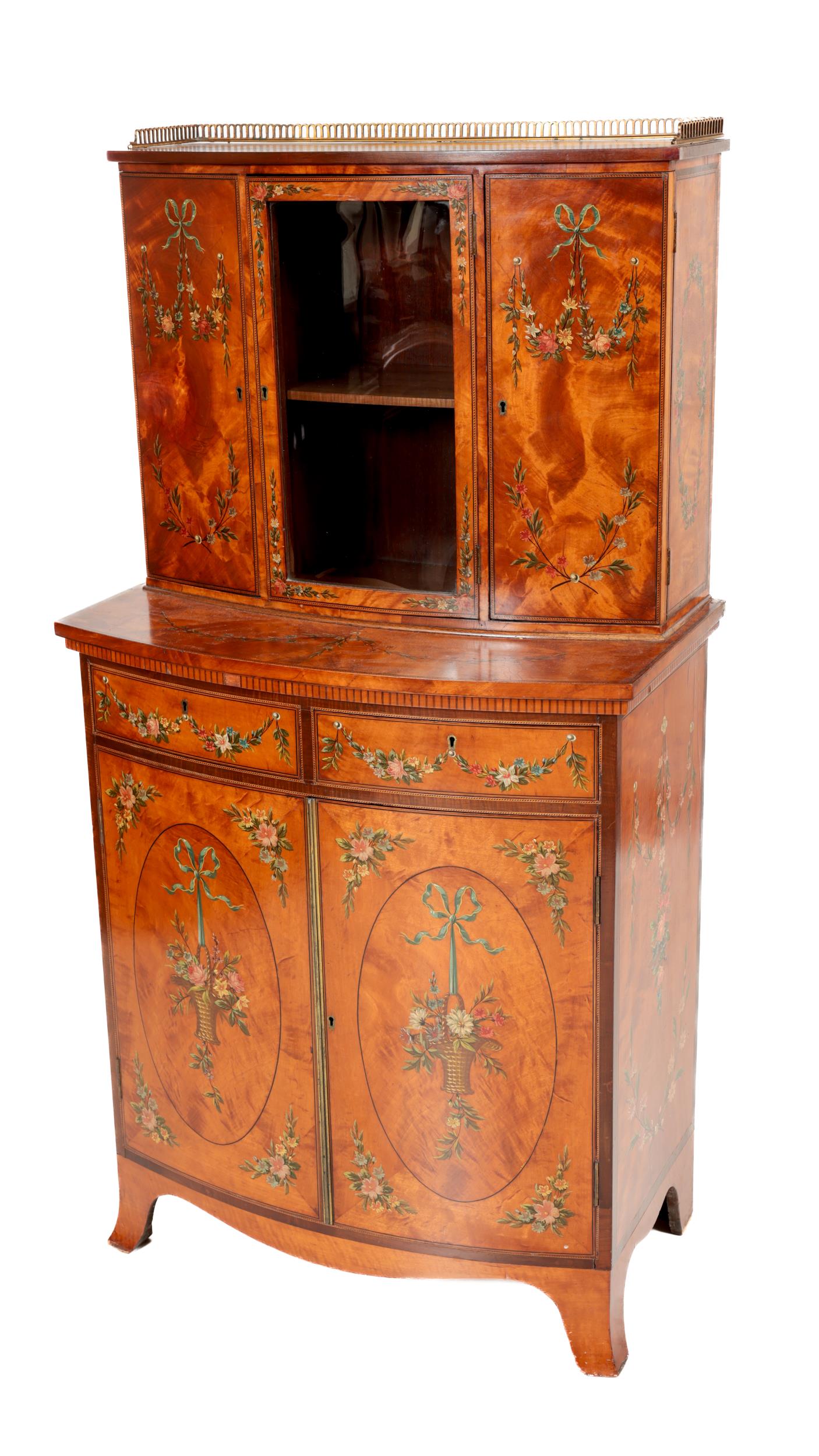 A fine quality satinwood hand painted Cabinet, of small proportions, the top section with pierced
