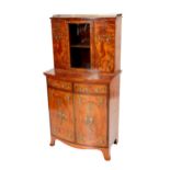 A fine quality satinwood hand painted Cabinet, of small proportions, the top section with pierced