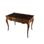 A very fine quality English Victorian Bureau Plat, the leather inset top with tooled gilt border,