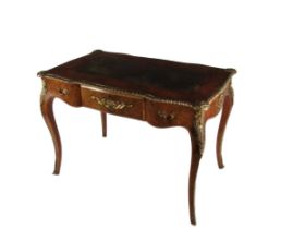 A very fine quality English Victorian Bureau Plat, the leather inset top with tooled gilt border,