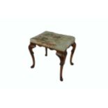 A 19th Century Queen Anne style walnut Stool, with padded seat over shaped frieze on cabriole