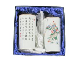 A pair of 19th Century Cantonese porcelain Brush Pots, with a male and female character on