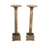 A fine quality pair of marble pillar Stands, the square tops over ormolu tops and bottoms with egg