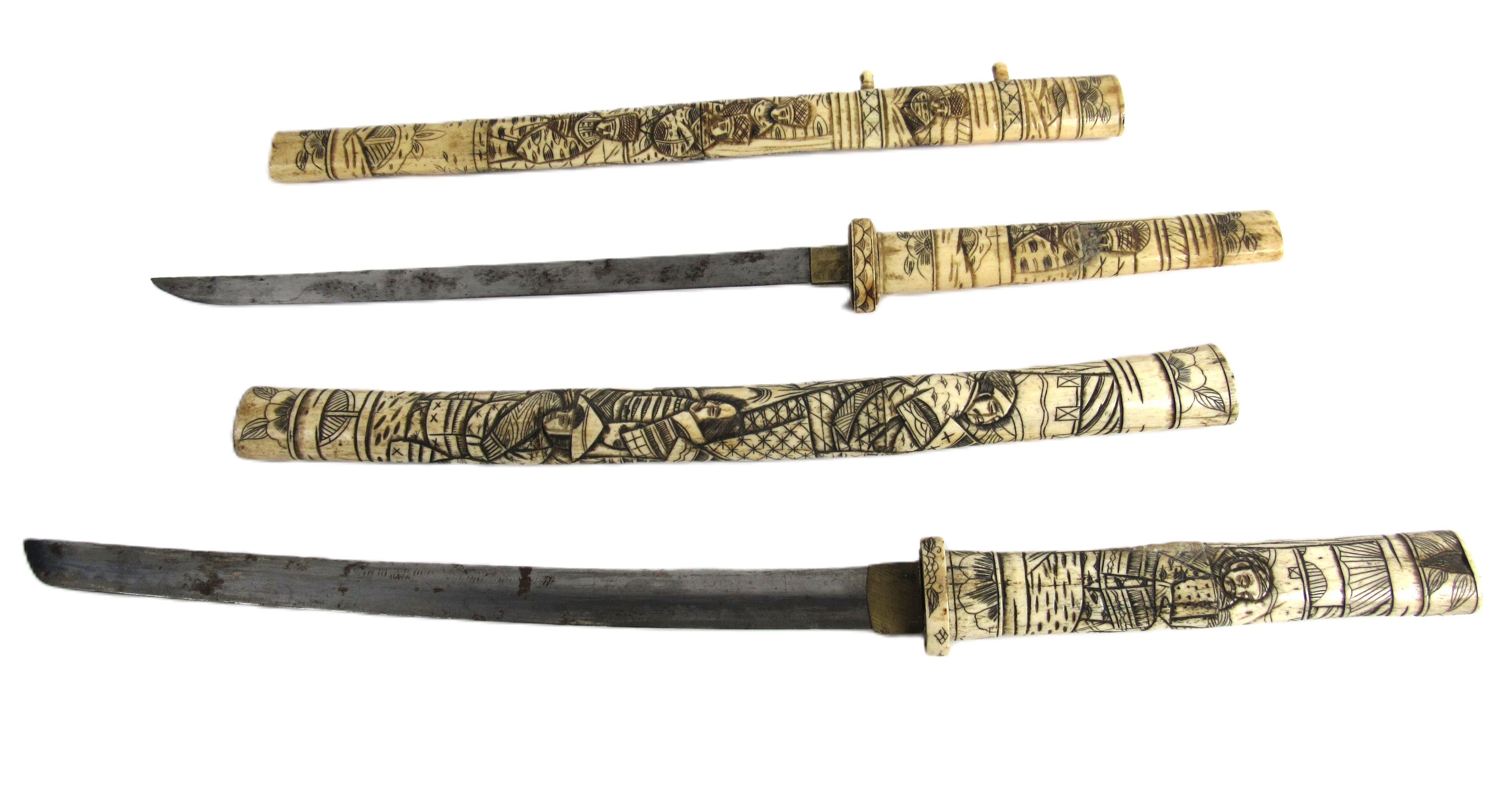 Militaria: Two similar 19th Century Japanese 'Tanto' - Wakizashi short Swords, each carved bone