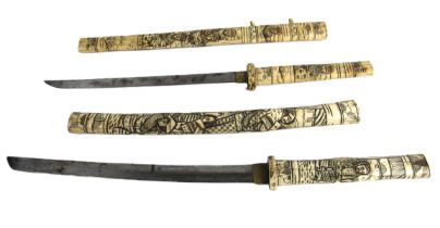 Militaria: Two similar 19th Century Japanese 'Tanto' - Wakizashi short Swords, each carved bone