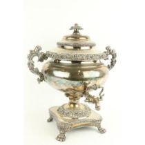 A good William IV period heavy silver plated and crested Tea Urn, with two ornate leaf cast handles,