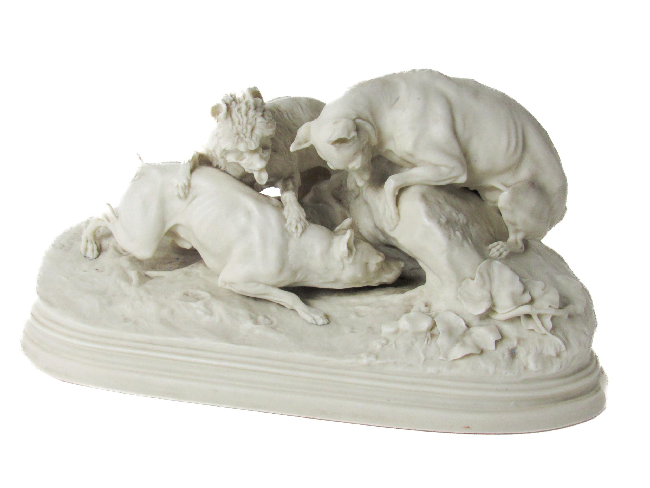A Copeland Parian ware Model, of a group of Terriers perched outside a rabbit hole, with