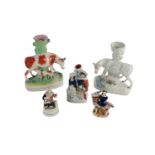 A collection of early Staffordshire porcelain Figures, comprising two large Vases, modelled as cow