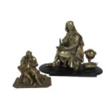 A cast brass Model, of a seated Philosopher, possibly Newton, wearing typical attire with paper