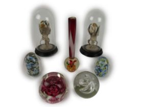 A collection of five varied decorative 'Murano' type glass Paperweights, and two unusual decorated