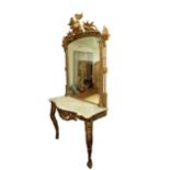 A Victorian giltwood Console Table and Mirror, the capital decorated with bird surmounted and leaf