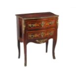 A French Louis XVI style bombe shaped Commode, of small proportions with floral marquetry top