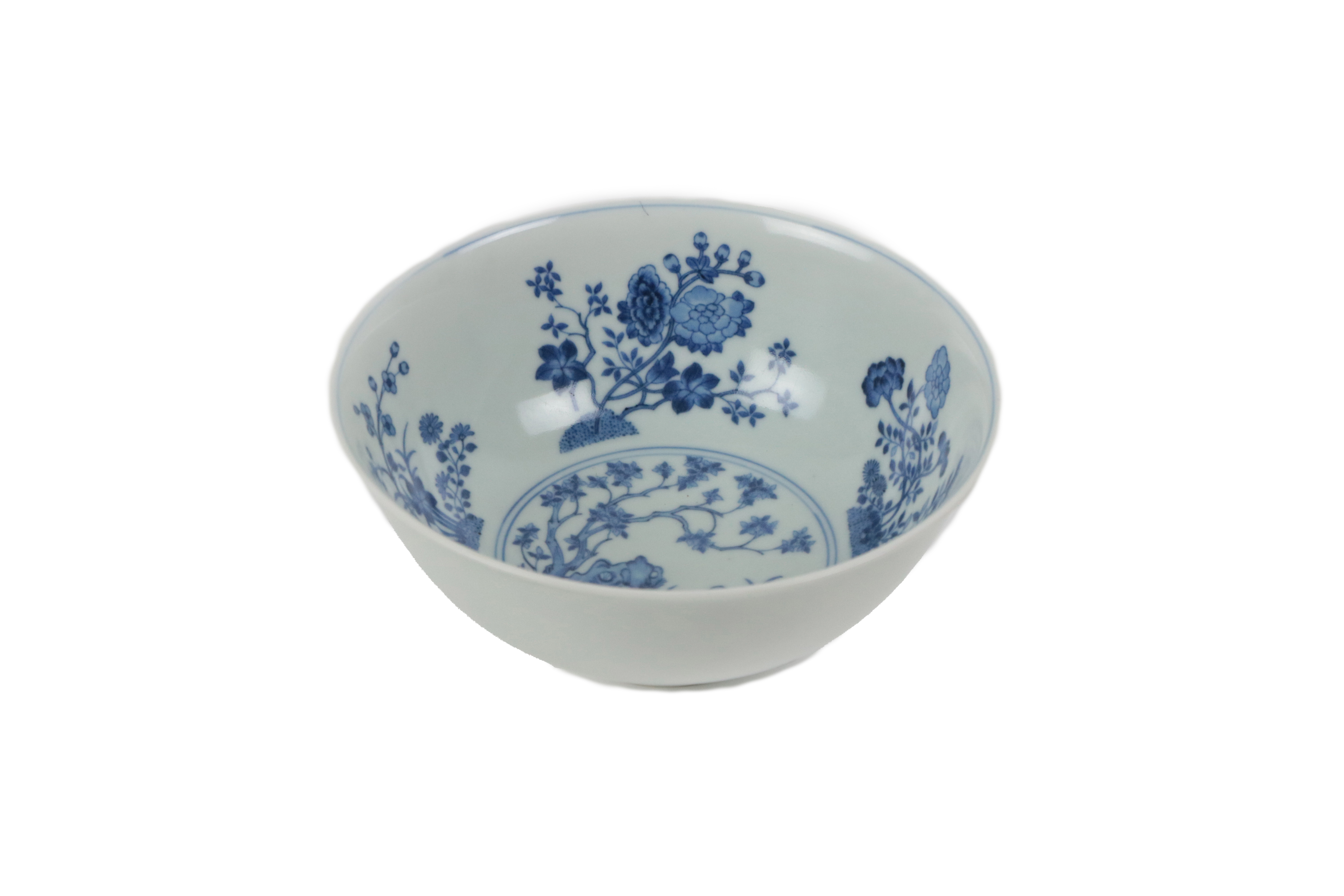 An attractive early Chinese blue and white 'Flower' Bowl, the interior decorated with central