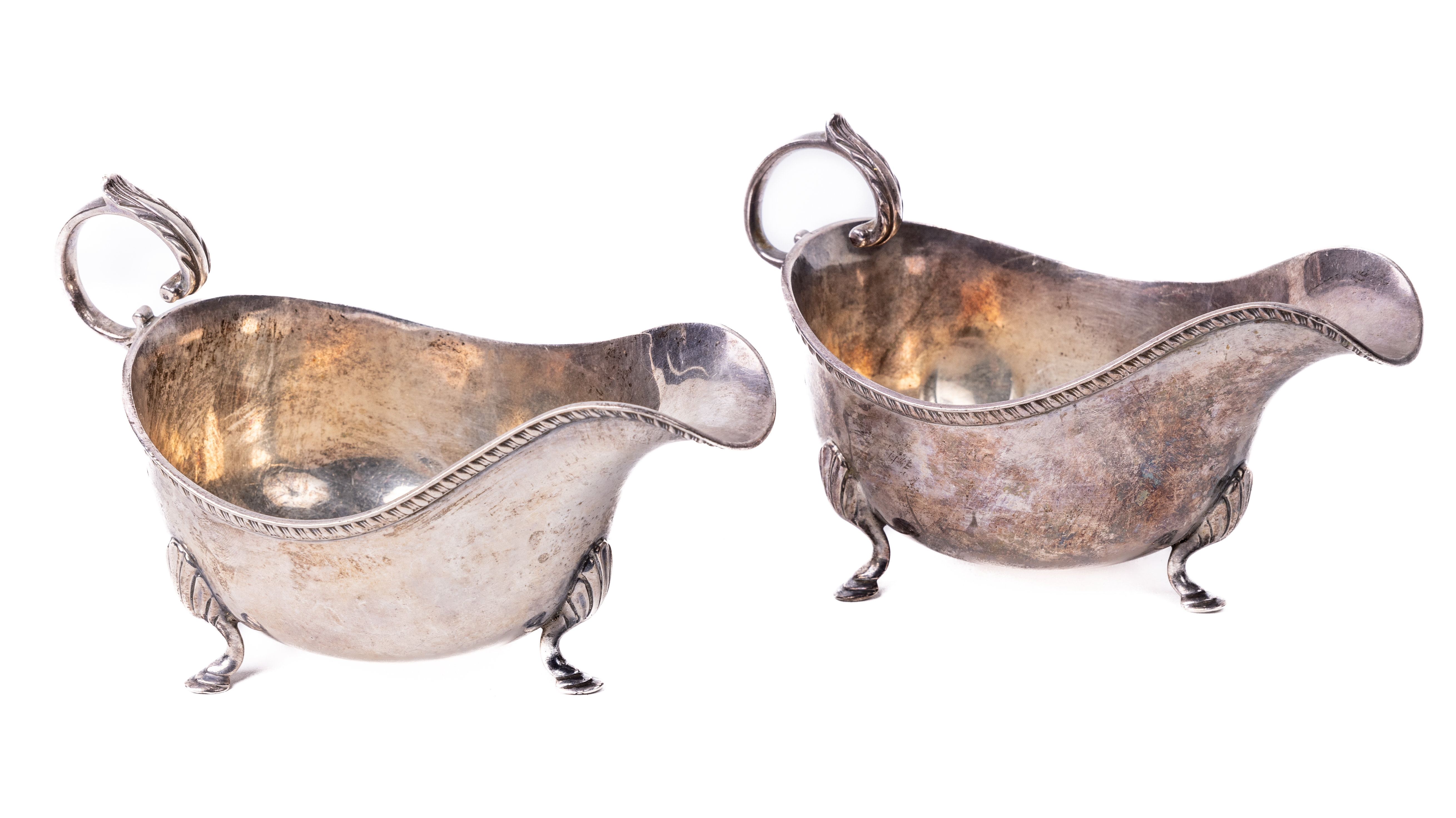 A pair of heavy English silver Georgian style Sauceboats, by Mappin & Webb, Birmingham 1910, each