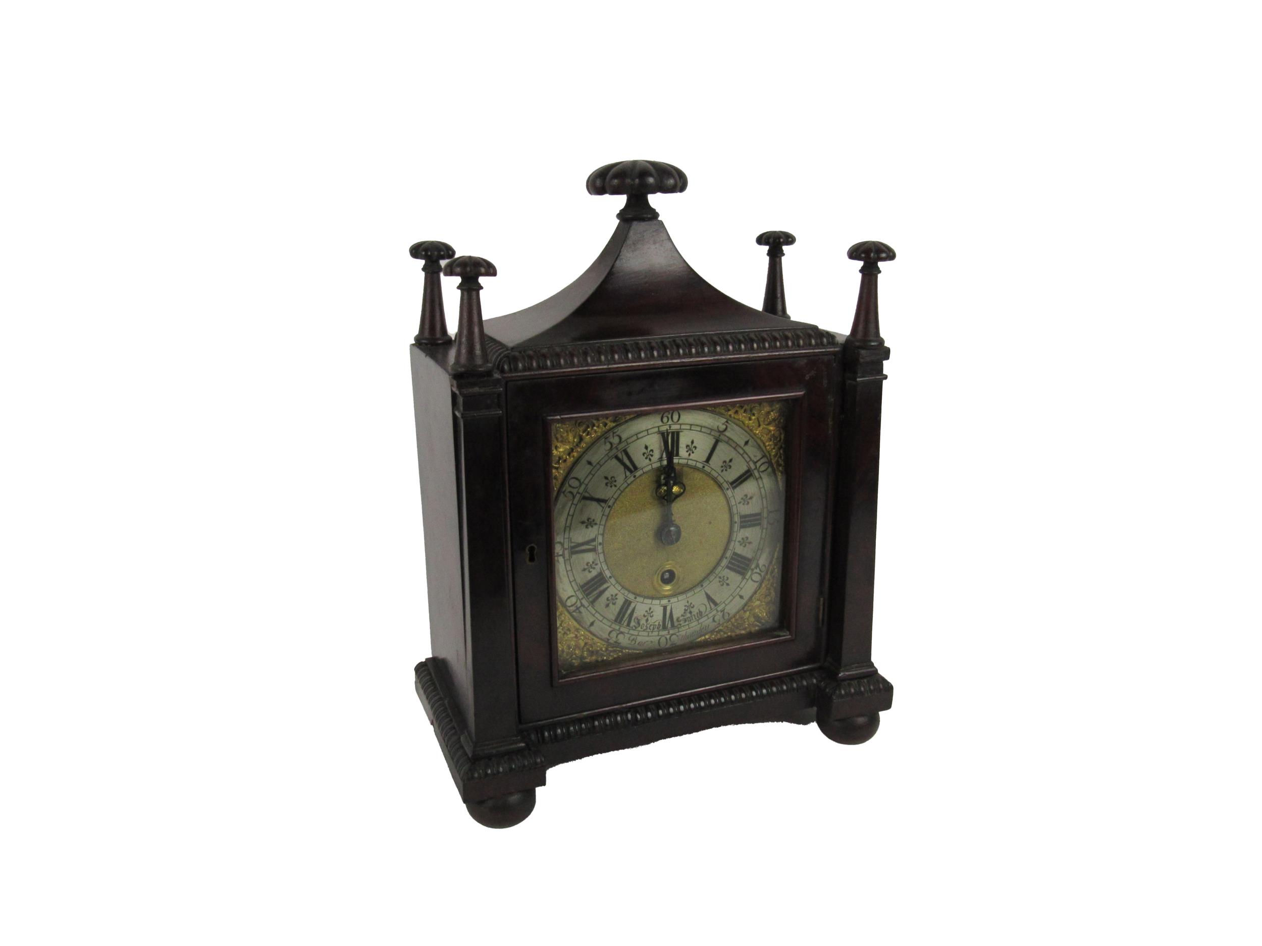 An important early 18th Century mahogany cased Bracket Clock, with square brass and silvered dial,