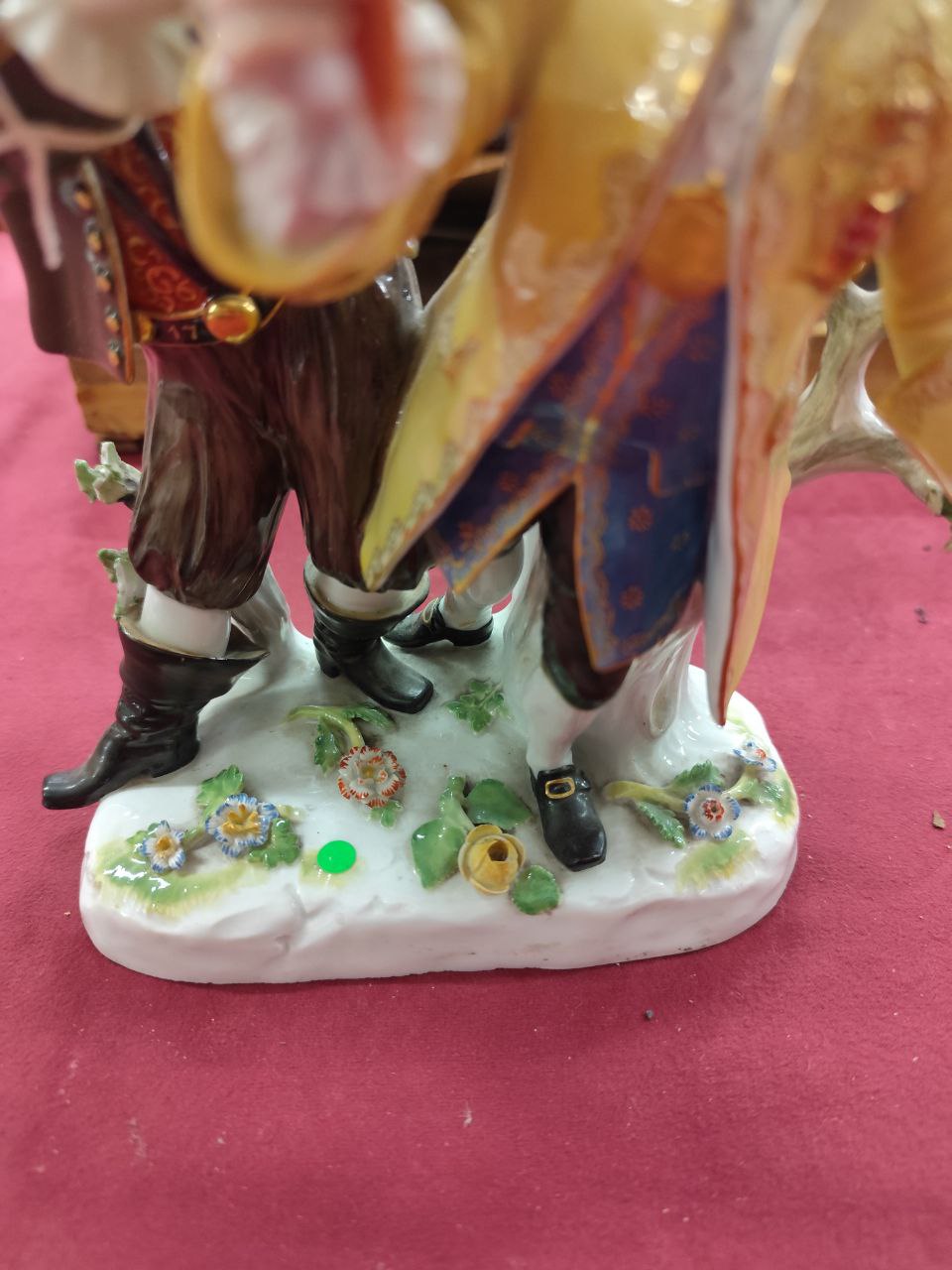 A large Meissen Group, with gentleman in bright yellow coat, and a Jester in green coat, offering - Image 2 of 5