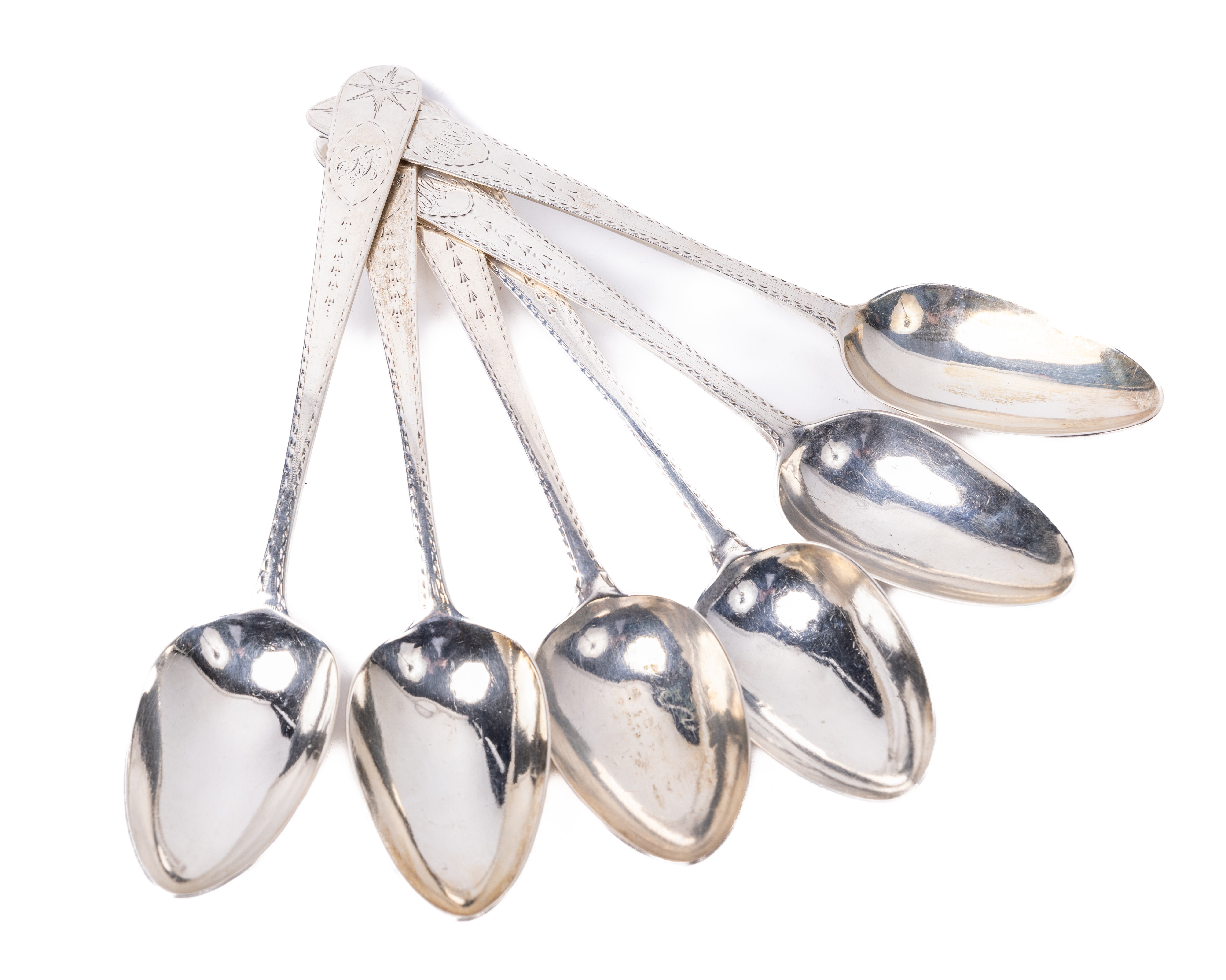 A fine quality set of 6 Georgian Irish silver bright cut Serving Spoons, each monogrammed with