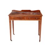 A 19th Century Ladies mahogany Writing Table, with shaped back, leather inset top over frieze