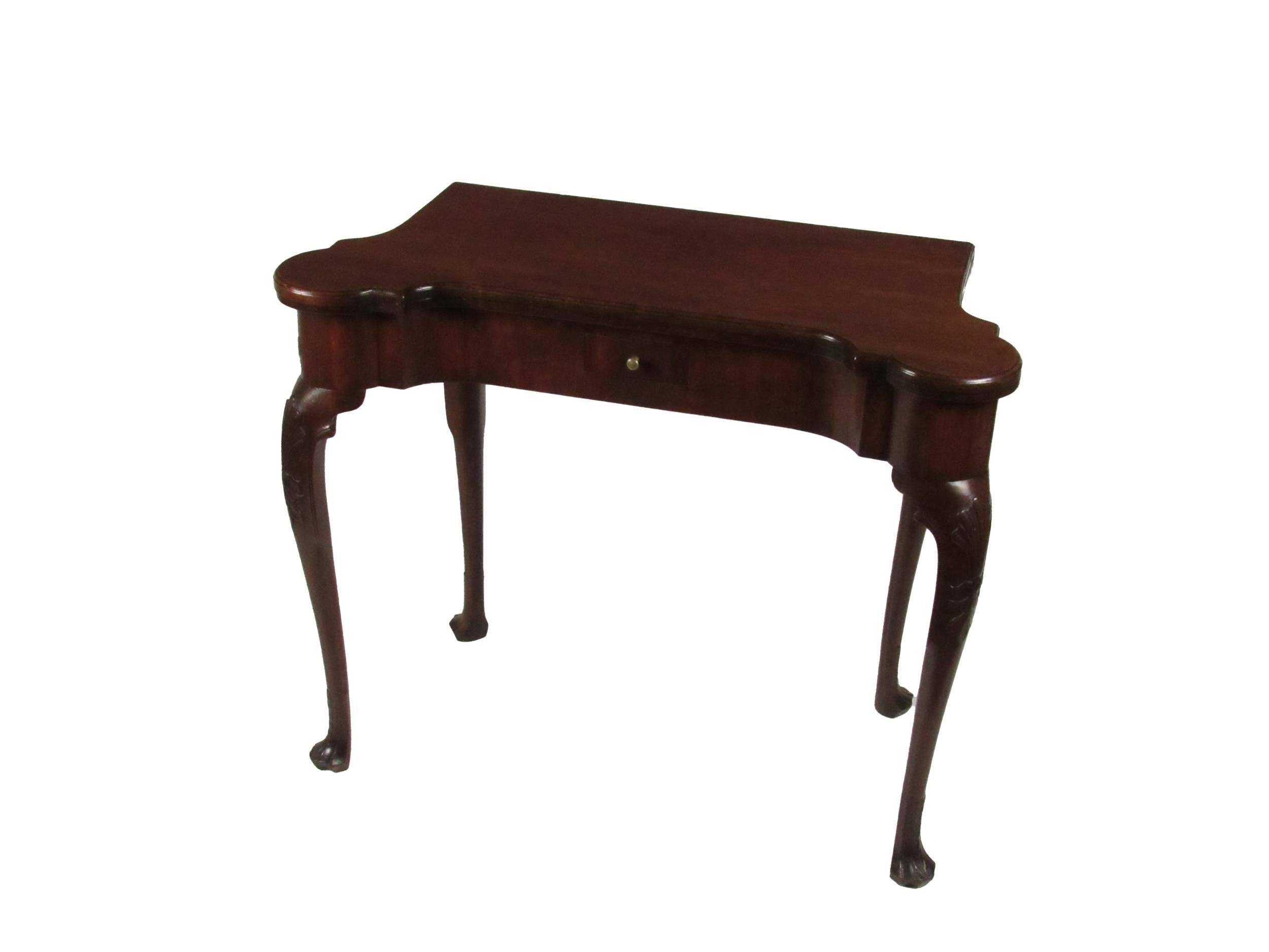 A fine quality Irish Georgian period mahogany fold-over Card Table, the shaped top opening to reveal