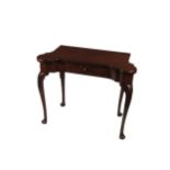 A fine quality Irish Georgian period mahogany fold-over Card Table, the shaped top opening to reveal