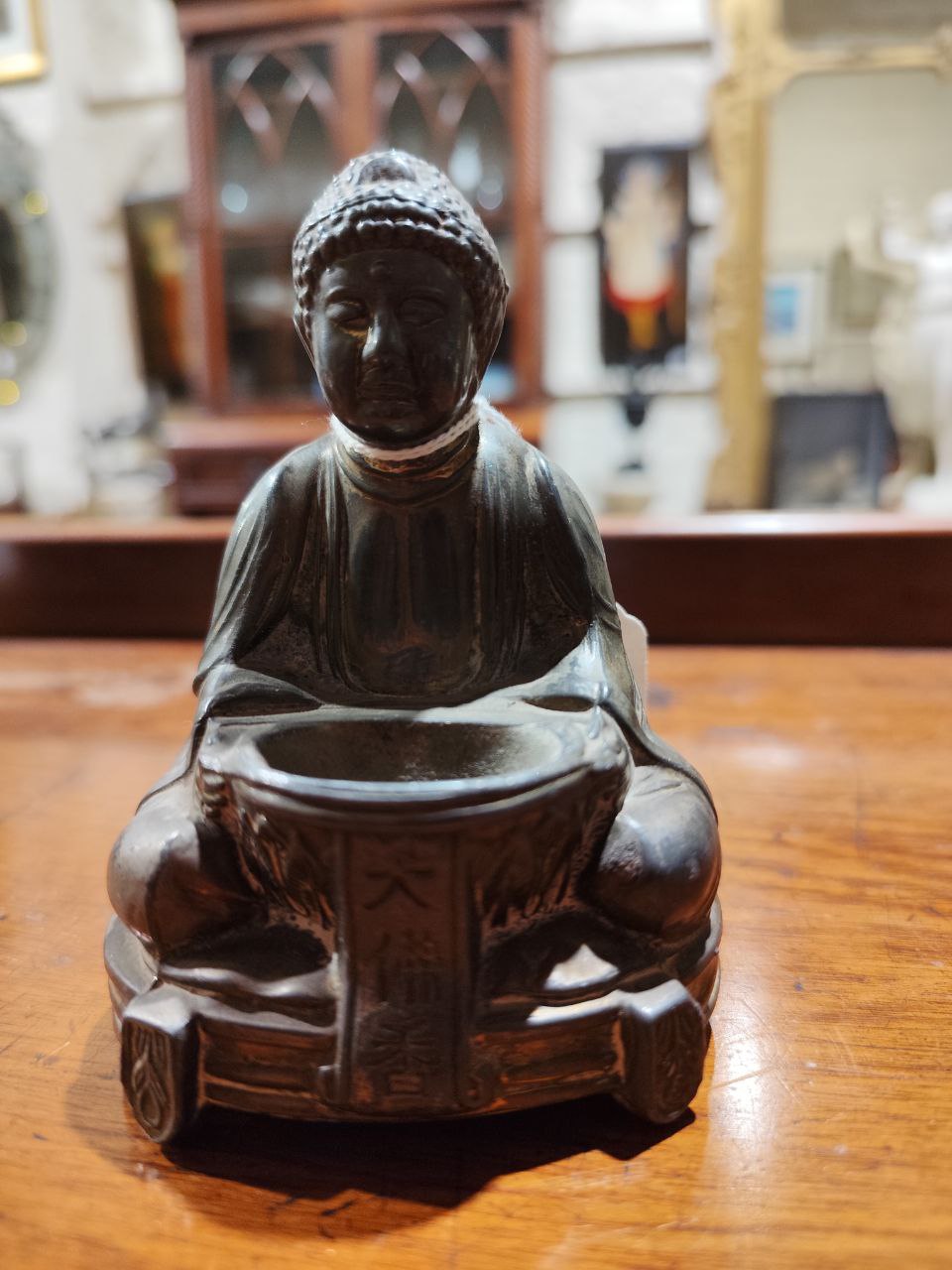 A blanc-de-chine Figure of a Buddha, a pair of carved ebony Elephants, a heavy engraved brass Bell - Image 9 of 16