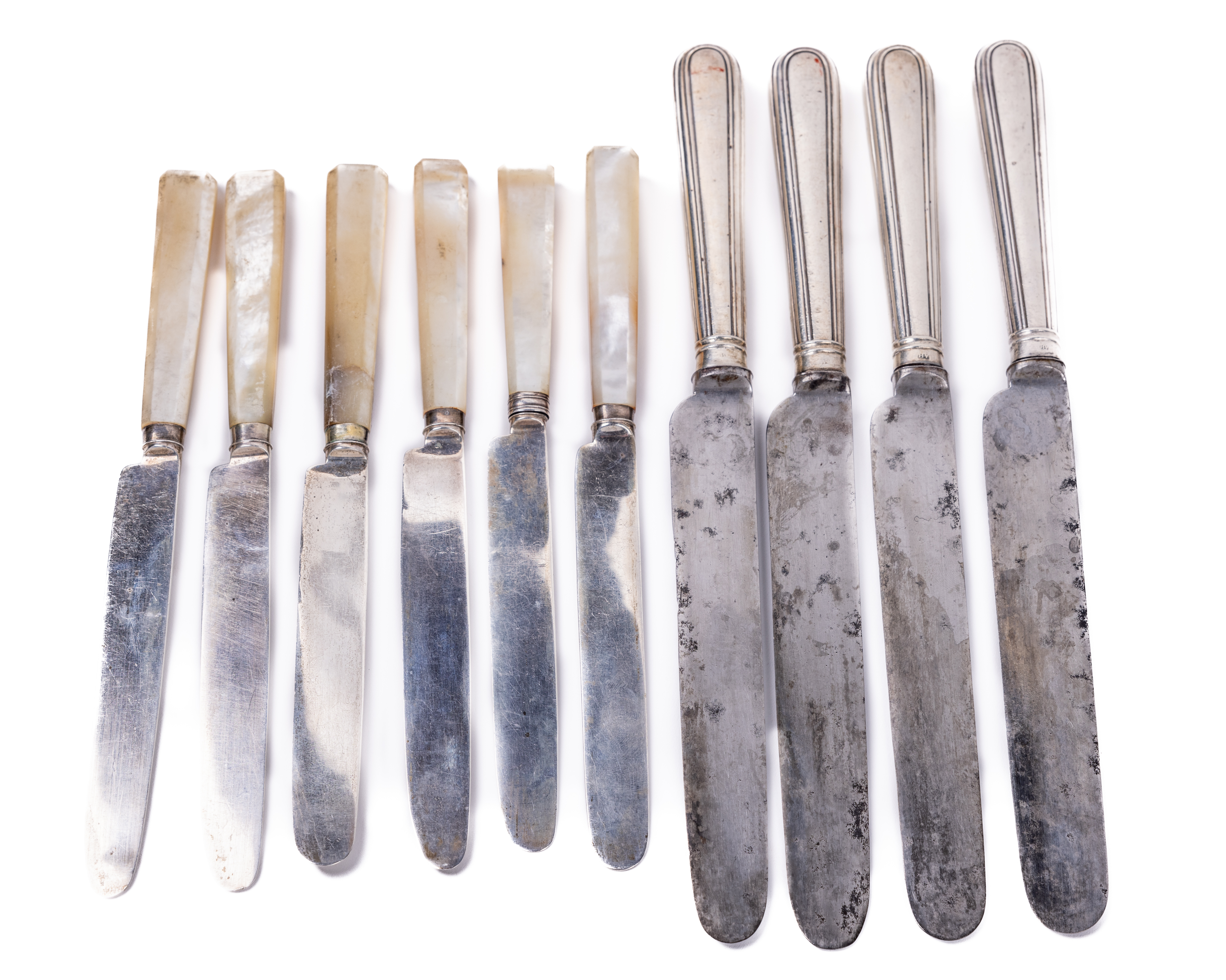 A set of four silver handled Dinner Knives, by Alexander Hewitt, London, with engraved crest of bird