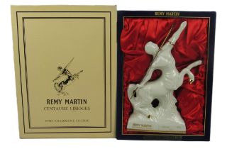 A cased Bottle of Remy Martin - Centenaire Limoges - fine Champagne Cognac, in cardboard box. (1)