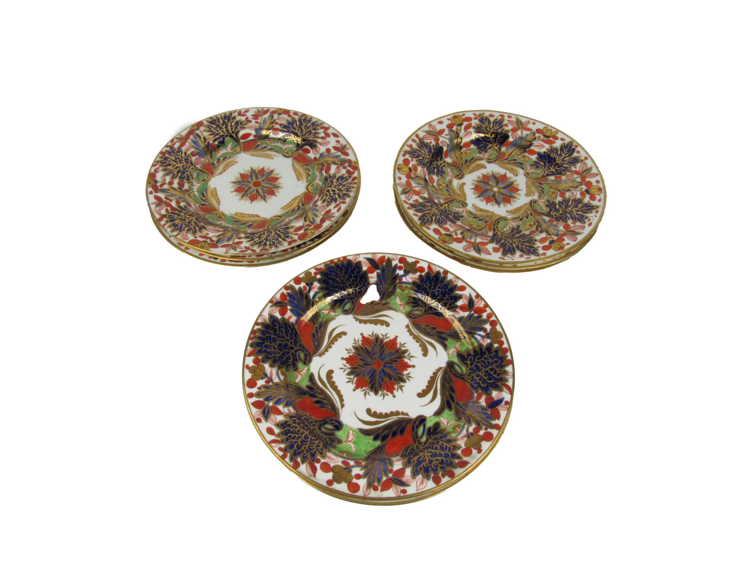 A fine set of 9 attractive early 19th Century Crown Derby 10" Plates, c. 1820. (9) Provenance: The