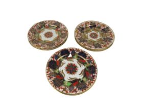 A fine set of 9 attractive early 19th Century Crown Derby 10" Plates, c. 1820. (9) Provenance: The