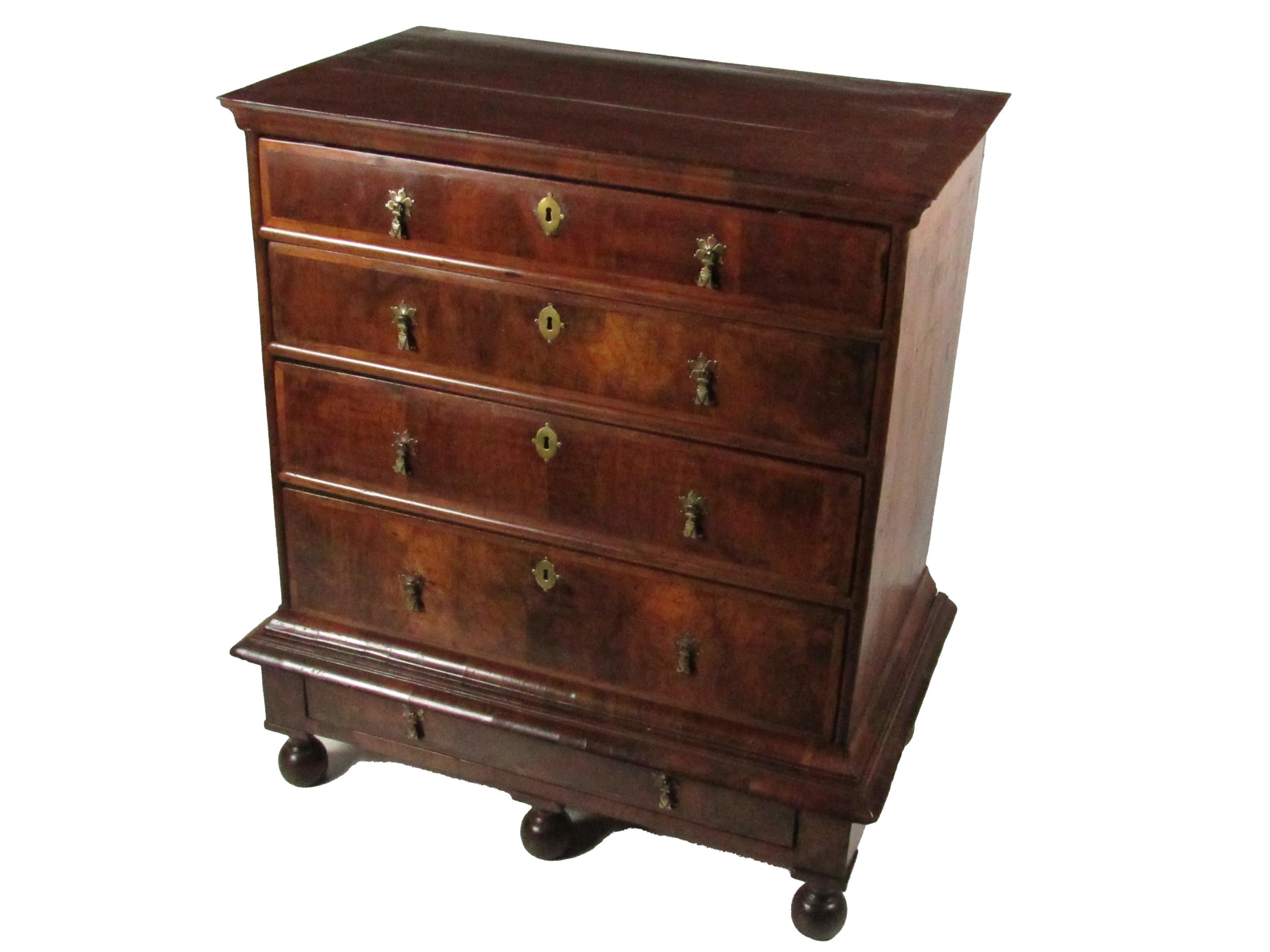 A fine quality 18th Century English Chest on Stand, the moulded crossbanded top over four graduating