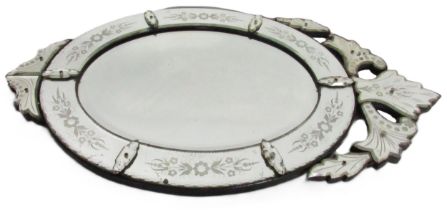 An antique Venetian style etched glass Wall Mirror, the oval bevelled glass with etched