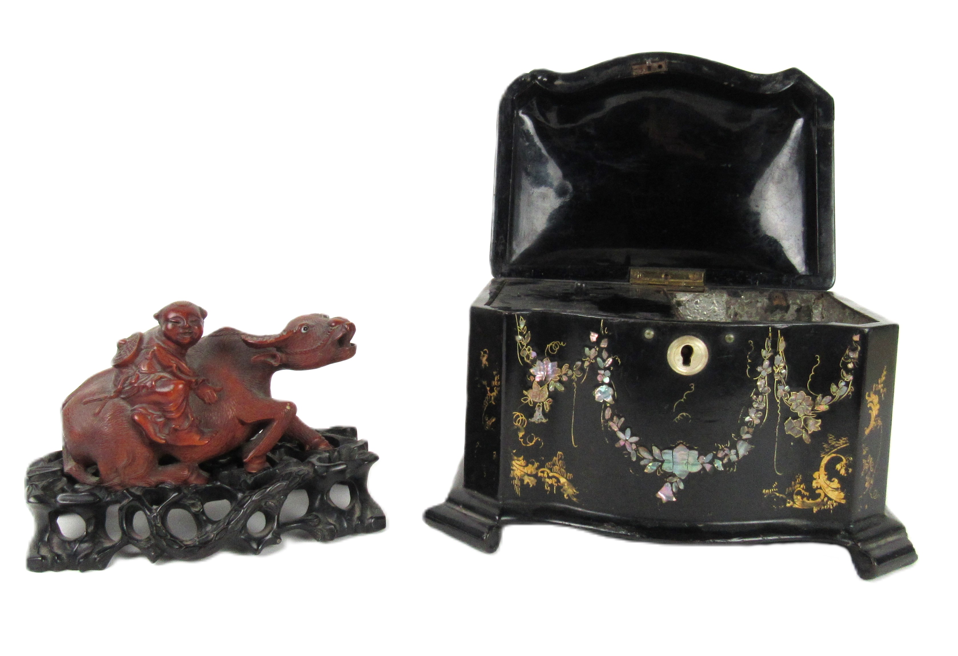 An attractive Oriental casket shaped mother-o-pearl floral design inlaid Tea Caddy, with hinged lid;