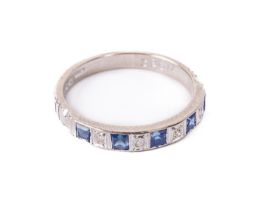 A Ladies 18ct white gold Ring Set, with princess cut sapphire and diamonds, four diamonds (.06ct)