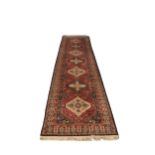 A 20th Century Middle Eastern style woolen Carpet Runner, by 'Jeravin' Belgium, with label, the