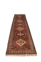 A 20th Century Middle Eastern style woolen Carpet Runner, by 'Jeravin' Belgium, with label, the