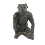 A Medieval heavy bronze Figure, of a seated horned figure or demon, repaired (head loose), approx.