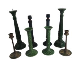 A pair of tall wooden pillar design green painted Pricket Candlesticks, approx. 36cms (14") tall;