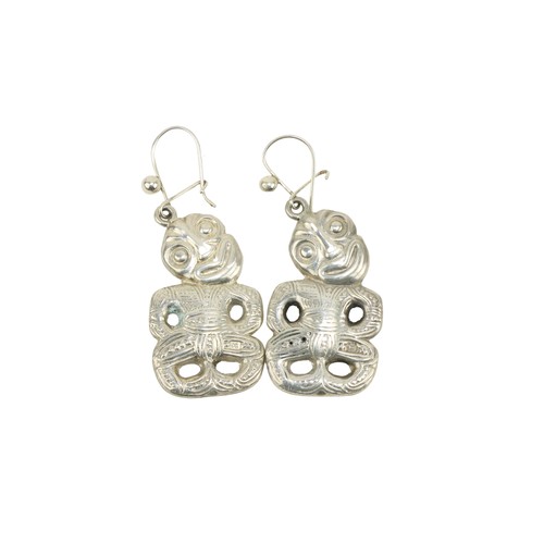 A pair of silver Ear-rings, modelled as Maori 'Hi-Tiki,' unusual. (2)