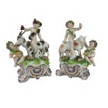 A very good pair of mid-18th Century bow porcelain Goat Groups, with kids and garlanded cupids,