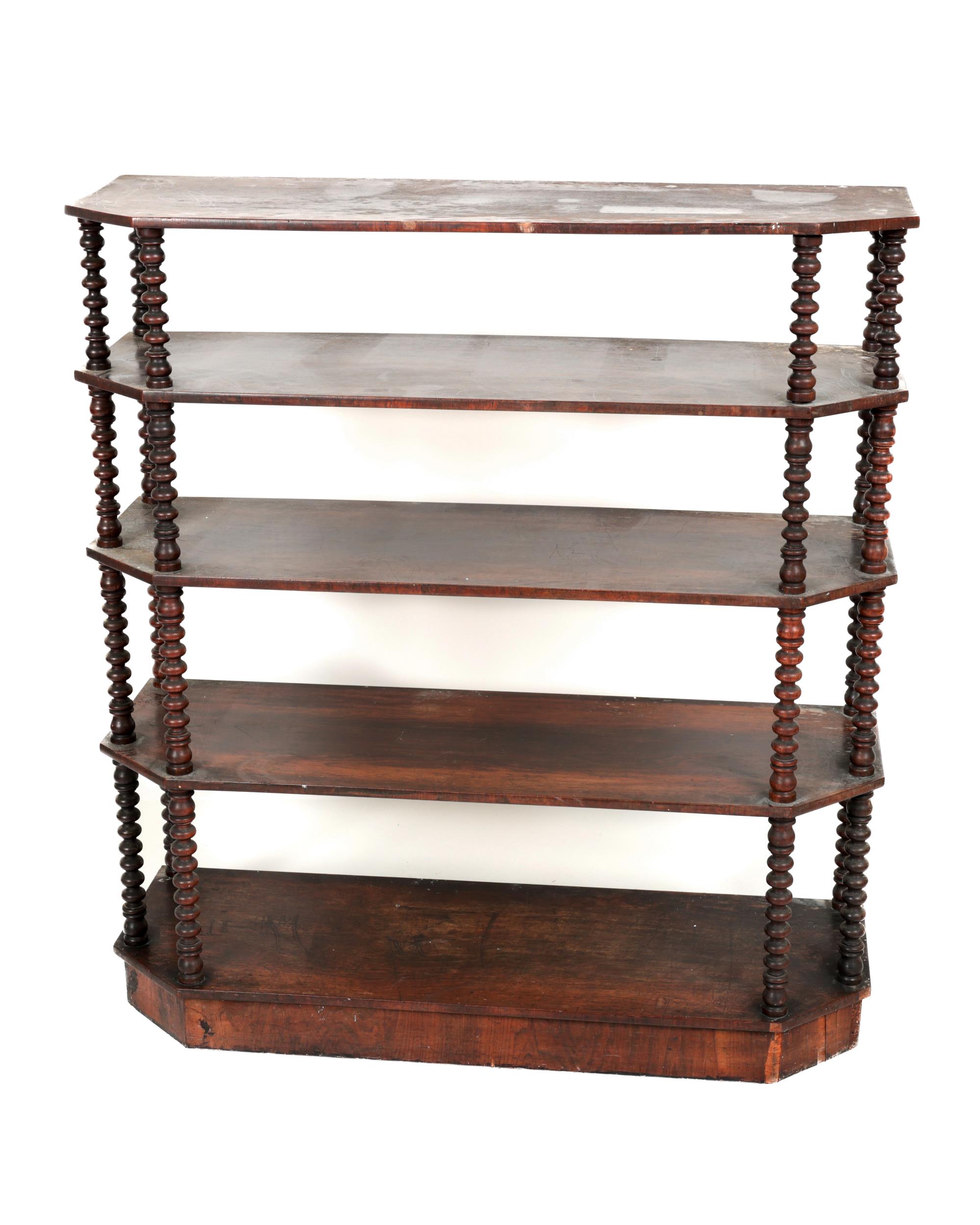 A Victorian mahogany four tier Whatnot, of shaped form with bobbin turned pillar supports on