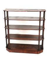 A Victorian mahogany four tier Whatnot, of shaped form with bobbin turned pillar supports on